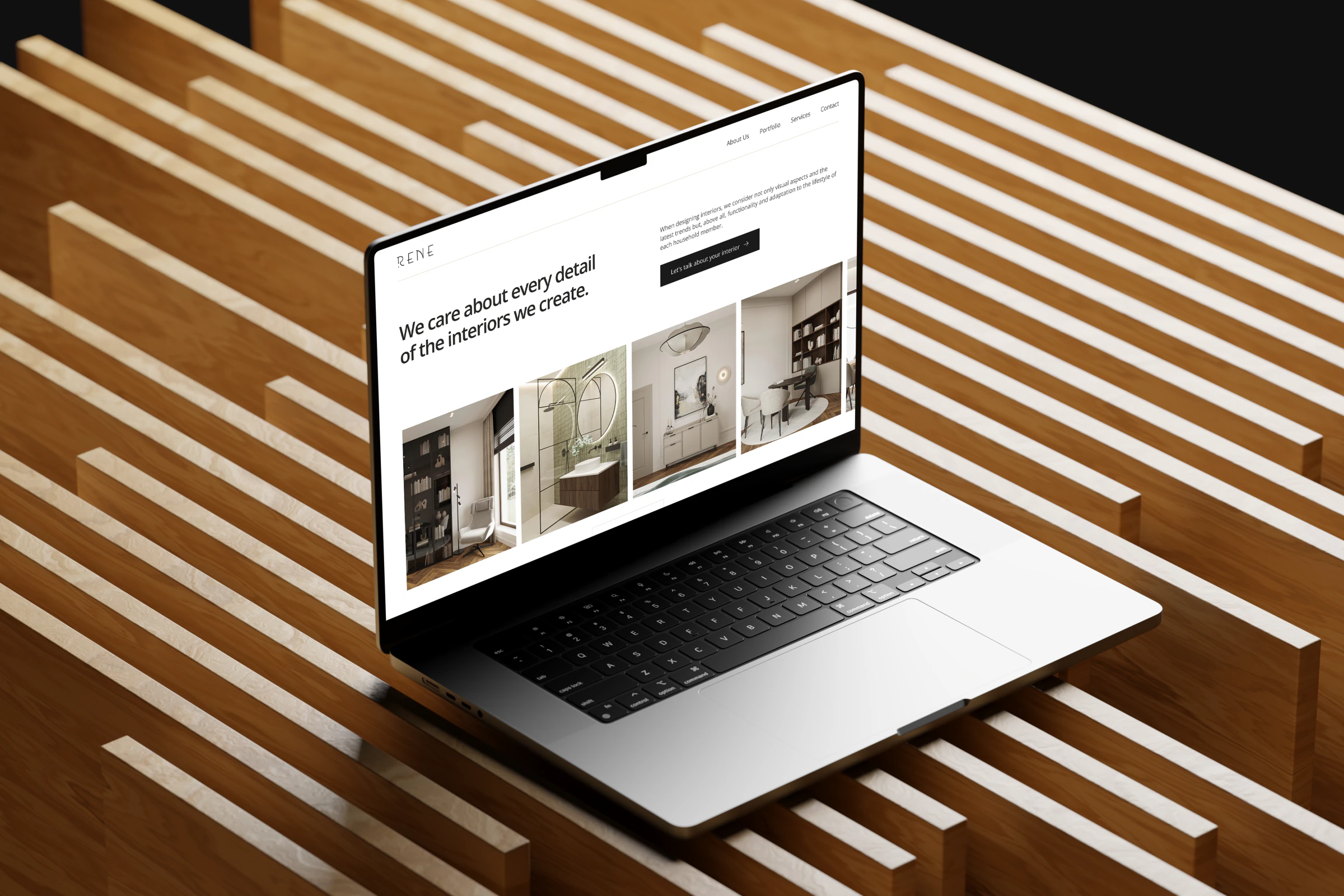 The homepage on a laptop: a quiet headline, one dark call to action, and a strip of the studio's own rooms doing the selling.